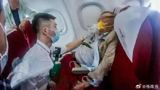 Title: Passengers Rally Behind Emergency Landing for Ill Fellow Traveller