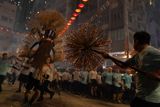 Three hundred performers carried a 67-metre dragon of straw and burning incense through Tai Hang's lanes on the first of three Mid-Autumn nights — a 150-year-old ritual still drawing crowds under an overcast moon.