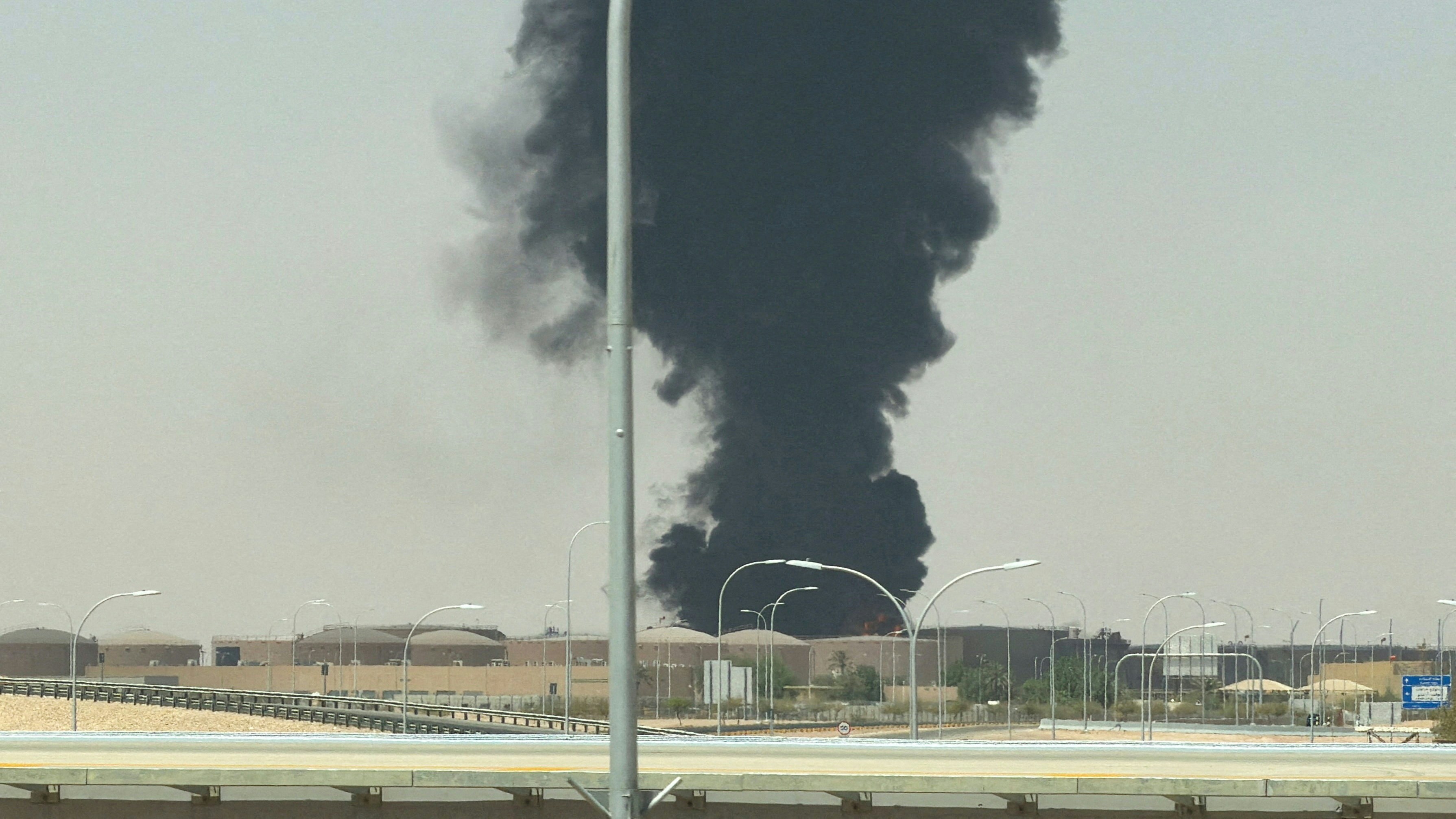 Smoke rises over dome-roofed structures in footage shared after the attack. Photo: HK01