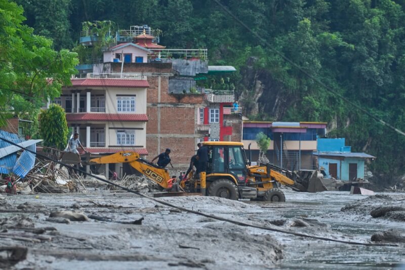 A glacial collapse on the Nepal side of the border sent debris through Tibet's Gyirong port, and by Wednesday night the two countries were counting nearly 300 dead and close to 1,400 missing. Premier Li Qiang arrived at the disaster zone as rescue teams watched a growing debris-dammed lake.