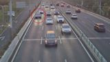 Chengdu's traffic authority has turned an AI screening system on 'turtle-speed' drivers — cars crawling far below the flow, often because the driver is on the phone — after footage showed one sedan overtaken 18 times in 200 meters. Offenders face 100-yuan fines and three license points.