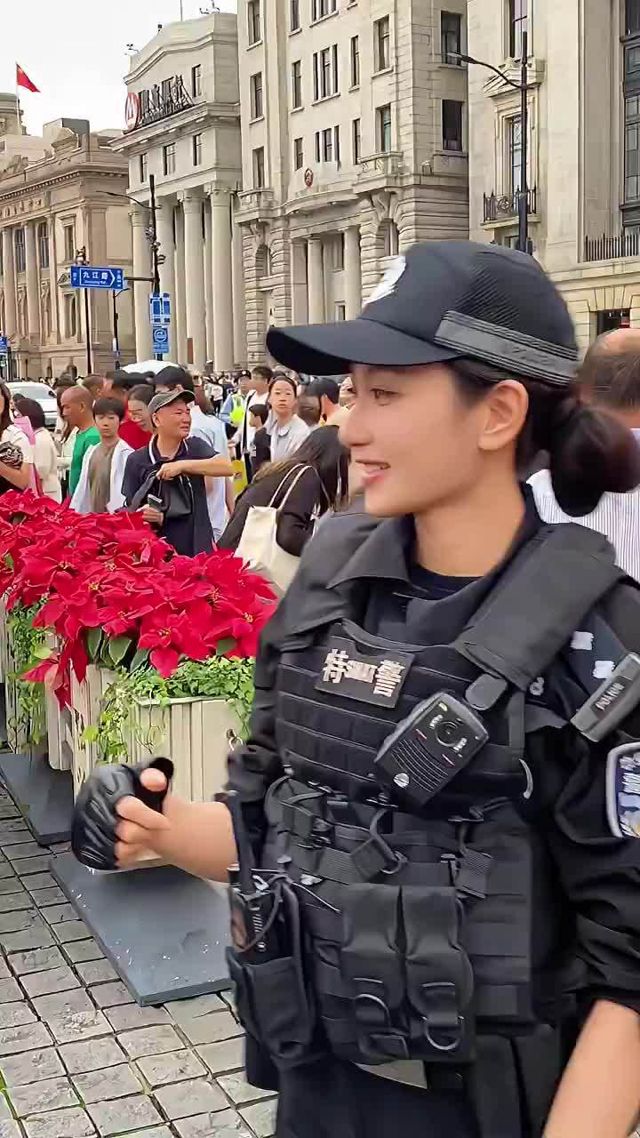 A Shanghai Officer Politely Declined a Tourist's Hug — and Started a Debate on Both Sides of the Camera