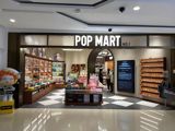 Pop Mart, the company behind the world's blind-box craze, disclosed that third-quarter revenue fell 45–50 percent from last year's record quarter — the first hard evidence that the resale speculation inflating the boom is cooling.