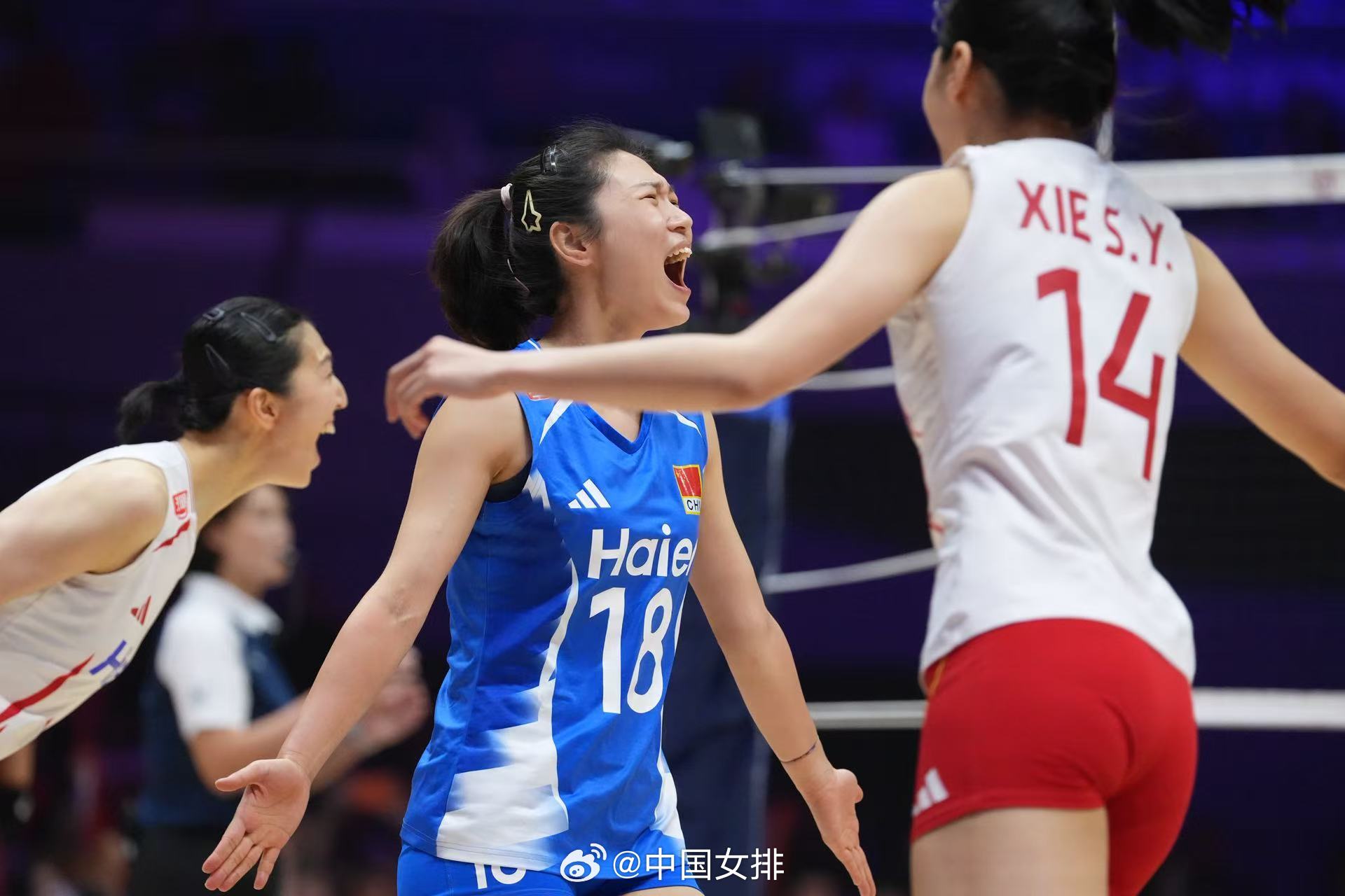 Three Chinese players celebrate during the tournament in Tianjin. Photo: @中国女排
