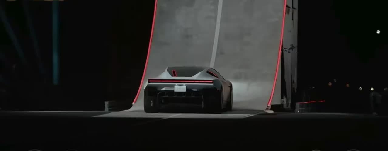 The Roadster's rear with its full-width light bar, photographed at the reveal. Photo: @SugarDesign
