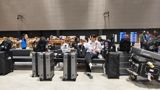 Days before the Aichi-Nagoya Asian Games opened, delegations including China's table tennis and gymnastics teams spent up to six hours at the airport waiting for buses that never came, after a booking-system failure left athletes hungry on the terminal floor — the first organizational crisis of a Games already criticized over its housing.