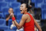A spectator's shout at a game point nearly broke the home favorite's serve rhythm in Beijing. Zheng held, won 7-6, 4-6, 7-5 in two hours and fifty-four minutes, and next faces the tournament's dark horse for a quarter-final place.