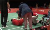 Liu Shengshu knelt on court in the deciding game of the Nagoya Asian Games women's doubles final and kept playing, then refused a wheelchair to walk off. She and Tan Ning lost 2-1 to South Korea — on a schedule players are calling brutal.
