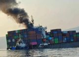After a container ship burned and sank in the Strait of Hormuz with iPhones aboard, fishermen salvaged brand-new handsets from the sea — and China's scalper premium on Apple's new foldable collapsed within a day, from 58,000 yuan to a few thousand.