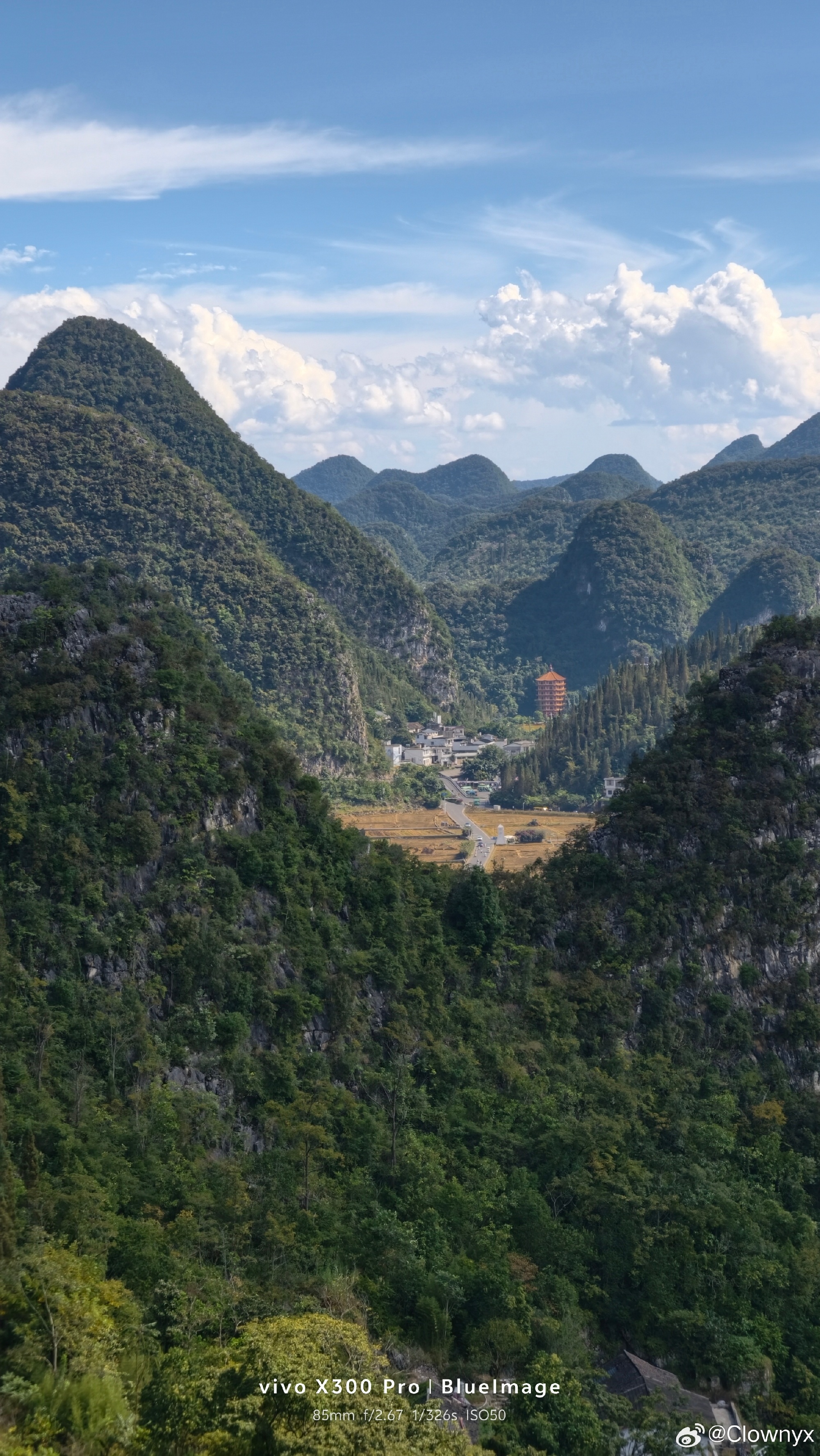 The karst peaks of Wanfenglin in Guizhou's Qianxinan prefecture, the kind of county scenery the meme chases. Photo: @Clownyx