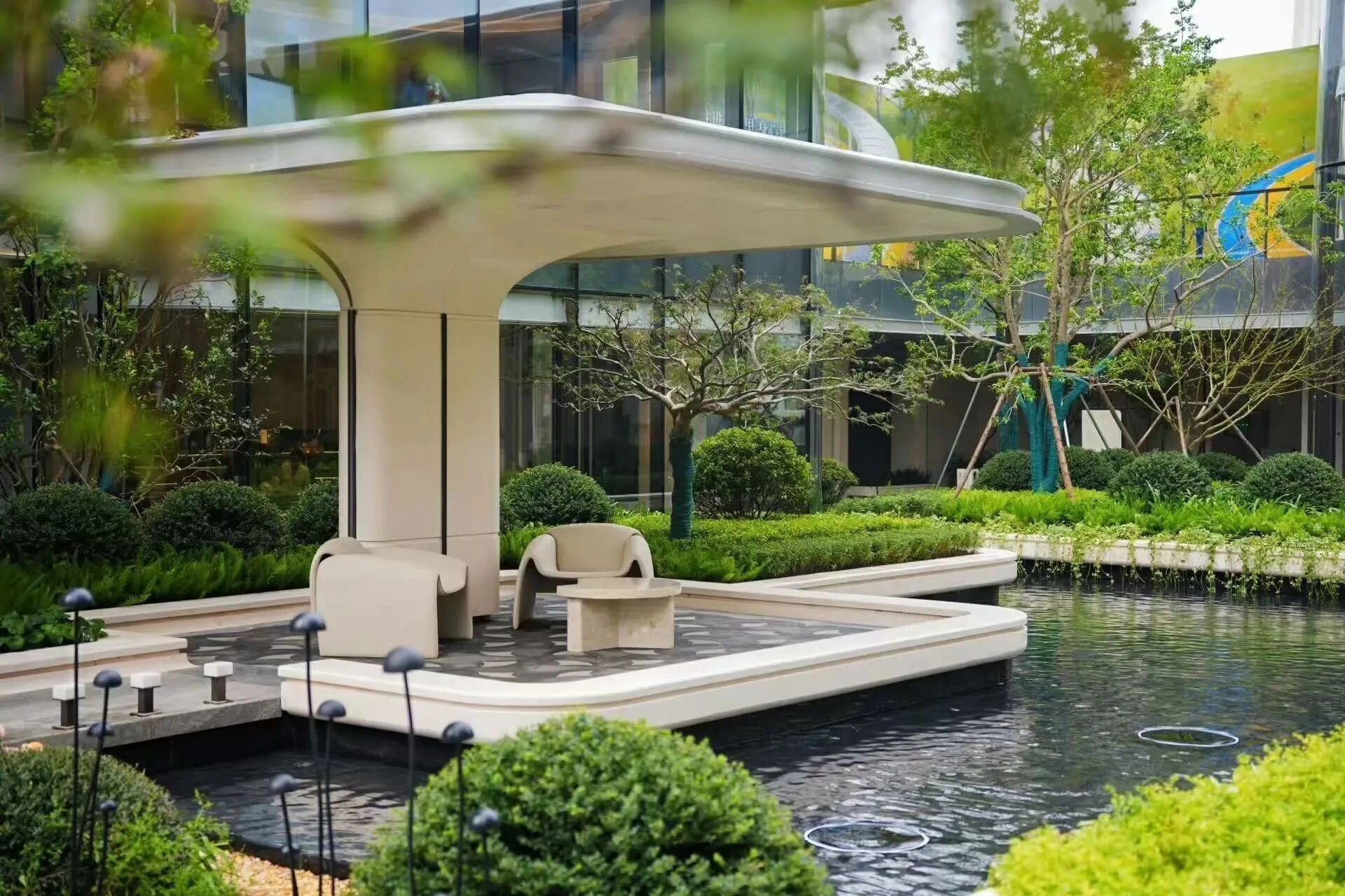 A rendering of the Xiaomi residential project's outdoor lounge area with a curved canopy. Photo: @宇飞视界