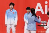 Lin Shidong and Kuai Man beat Wang Chuqin and Sun Yingsha 4-0 in the all-Chinese Asian Games mixed doubles final in Nagoya — and the losing pair's captain framed their silver as the gold 'held together', before a press-conference aside set social media alight.