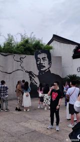 The quiet streets of Shaoxing, Zhejiang Province, have long been a pilgrimage route for admirers of Lu Xun, the early‑twentieth‑century writer whose sharp critiques helped shape modern Chinese literature. Within the modest courtyard of his former residence, now the Lu Xun Memorial Hall, a modest wall‑mounted painting has become the flashpoint of a debate that has roiled social media, drawn the attention of scholars, and raised questions about how societies balance historical fidelity with contemporary public‑health concerns.