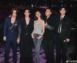 In a recent turn of events, Ken Chu's wife, Han Wenwen, found herself at the center of a heated online debate after sharing a photo featuring herself alongside the iconic Taiwanese boy band, F4. The image, which quickly became a hot topic on Weibo, showcases Han Wenwen positioned in the middle of the group, a spot that fans historically associate with Barbie Hsu, known for her role as Shan Cai in the widely acclaimed series "Meteor Garden."